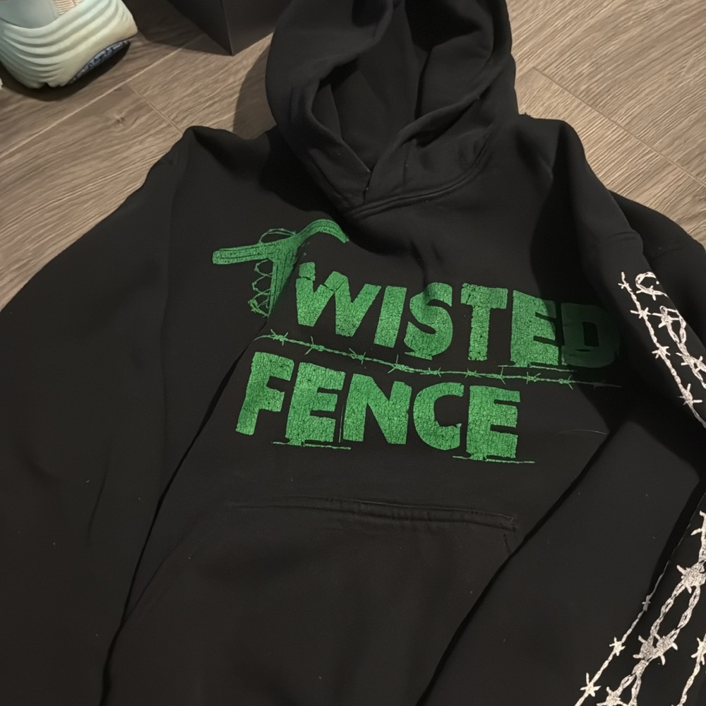 Black Hoodie with Green Twisted Fence Graphic